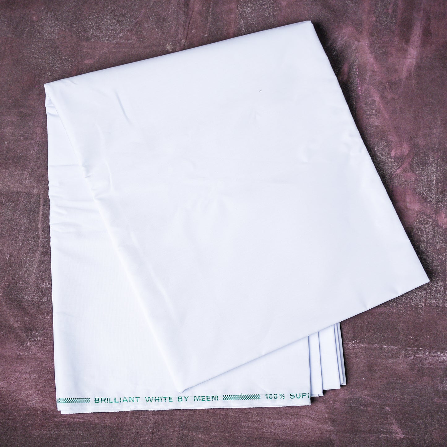 Brilliant White Meem Retail. Premium Cotton Fabric in Pakistan